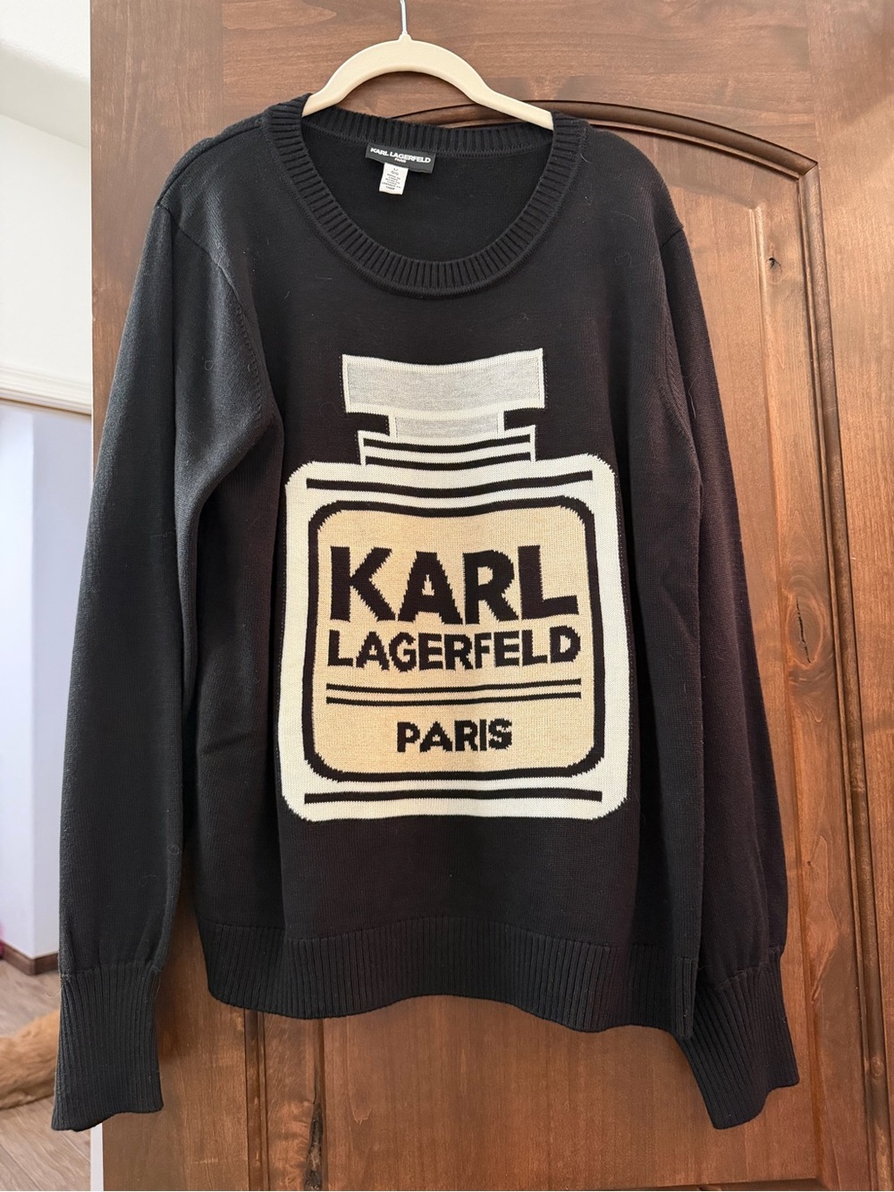 NWOT size L Karl Lagerfeld Black Crewneck Sweater with Cream Logo Bottle Graphic